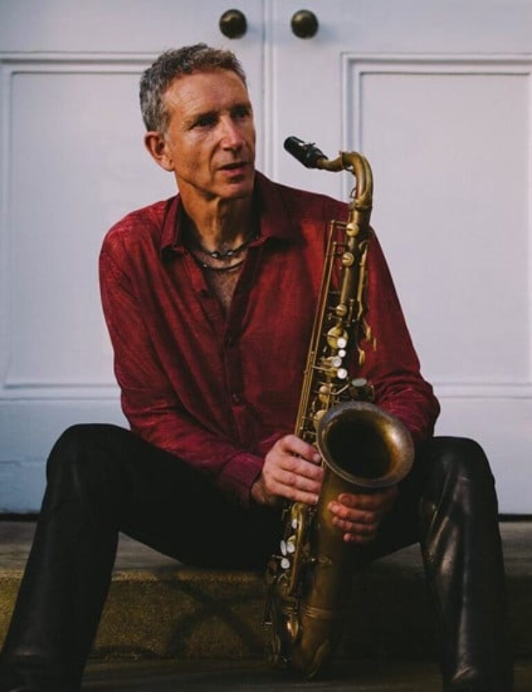 Snake Davis holding Tenor Sax