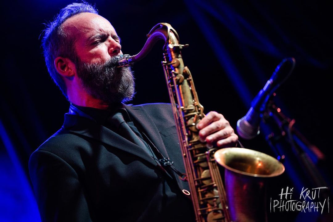 Scott Gilman plays saxophone